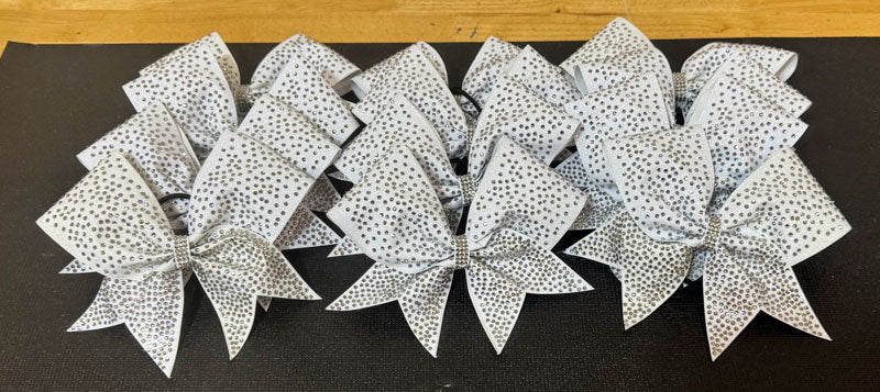 black diamond stones on white glitter cheer bows
