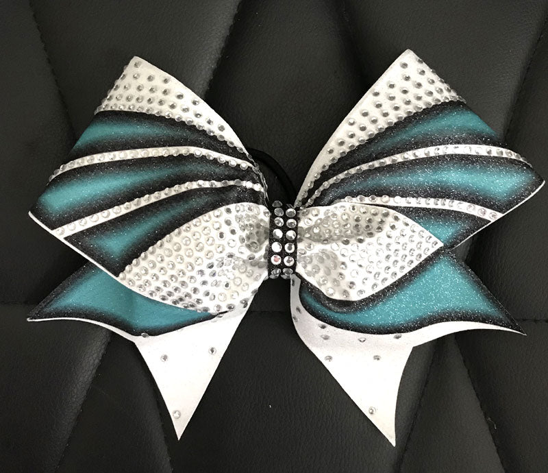 cheerleading hair bow in teal white and black with rhinestones